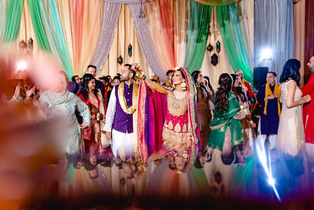 South Asian wedding photographer capturing vibrant and traditional moments at an Indian wedding.